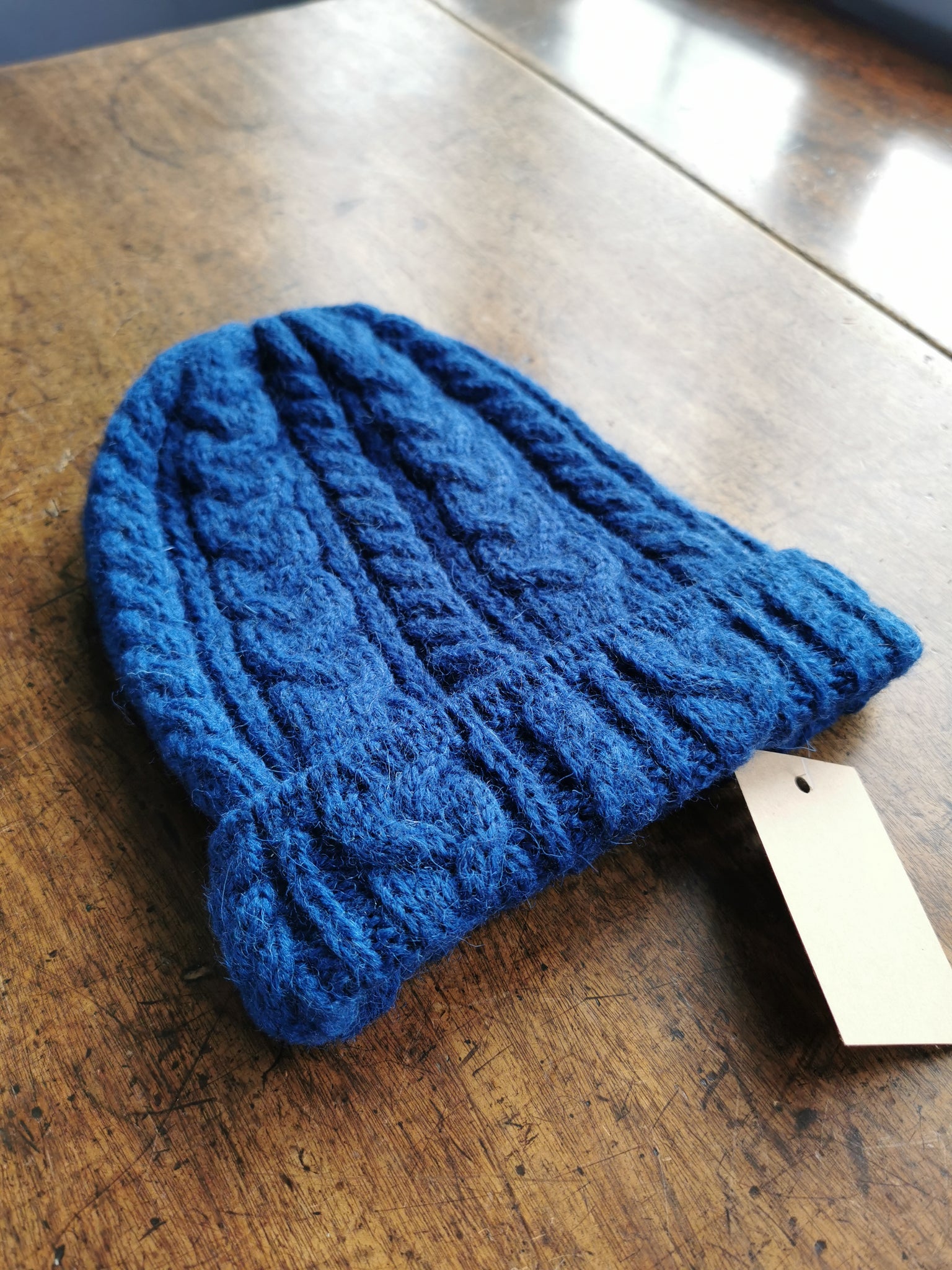 Our Little Cabin beanies are made from 100% Organic wool in Ireland. Woven at the Kerry Woollen Irish mill Est. 1760. Available in a variety of contemporary colors. One size fits all.