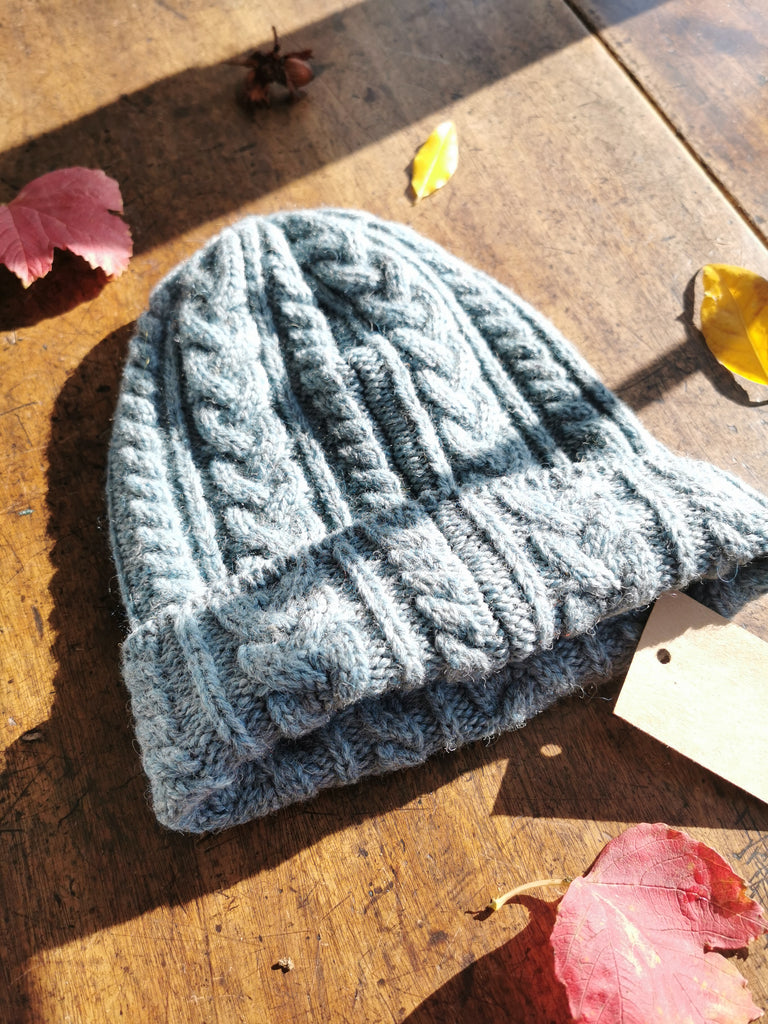 Our Little Cabin beanies are made from 100% Organic wool in Ireland. Woven at the Kerry Woollen Irish mill Est. 1760. Available in a variety of contemporary colors. One size fits all.