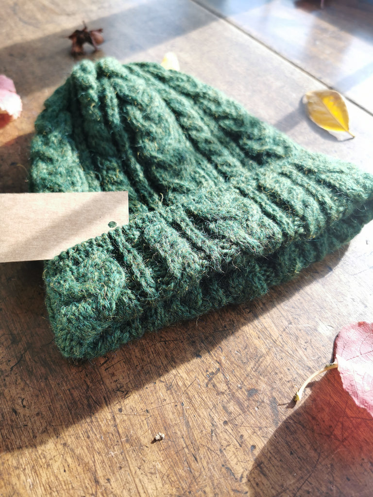 Our Little Cabin beanies are made from 100% Organic wool in Ireland. Woven at the Kerry Woollen Irish mill Est. 1760. Available in a variety of contemporary colors. One size fits all.